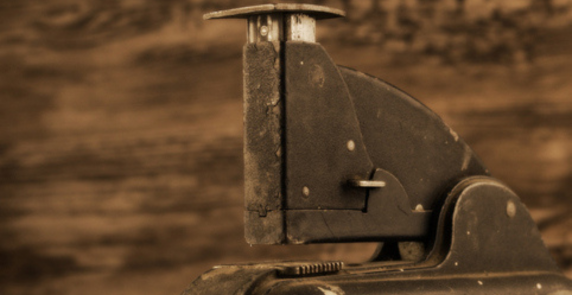 an image of an antique stapler